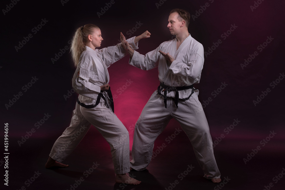 Taekwondo, Kampfkunst, junges Paar beim Taekwondo Training Taekwondo, Kampfkunst, junges Paar beim Taekwondo Training