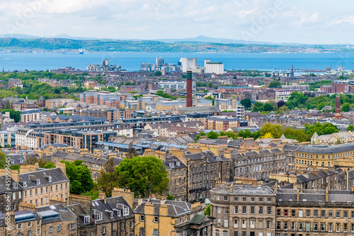 A panorama view from the top of Calton Hill towards the suburb of Leith, Edinburgh, Scotland on a summers day