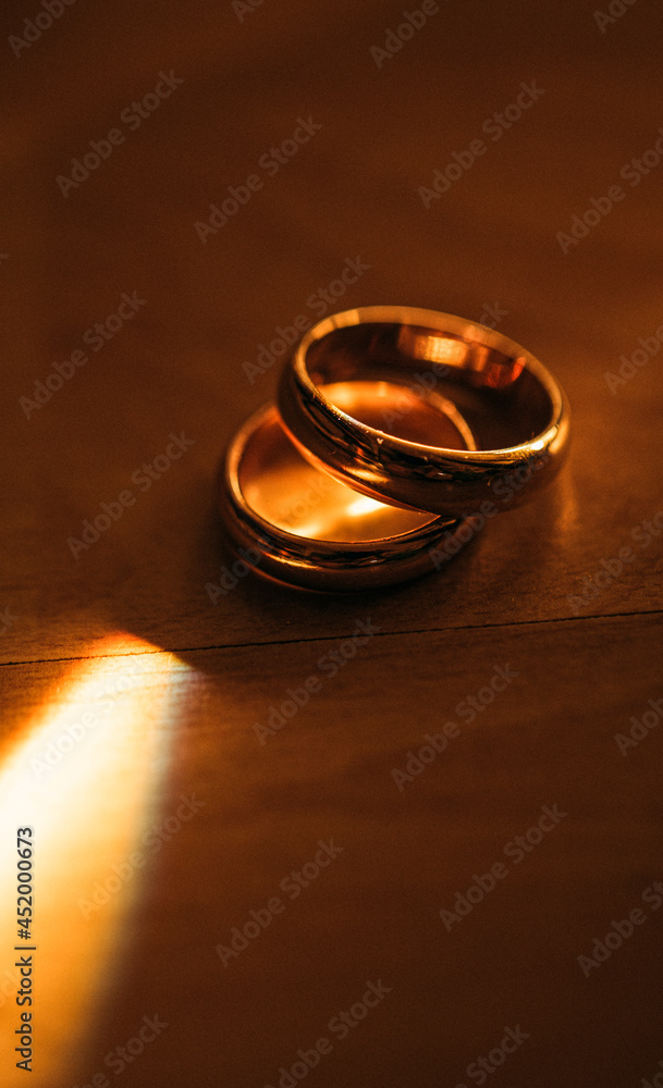 wedding rings on the table. Ring. Marriage. Golden wedding rings on the table. Ring. Marriage. Golden