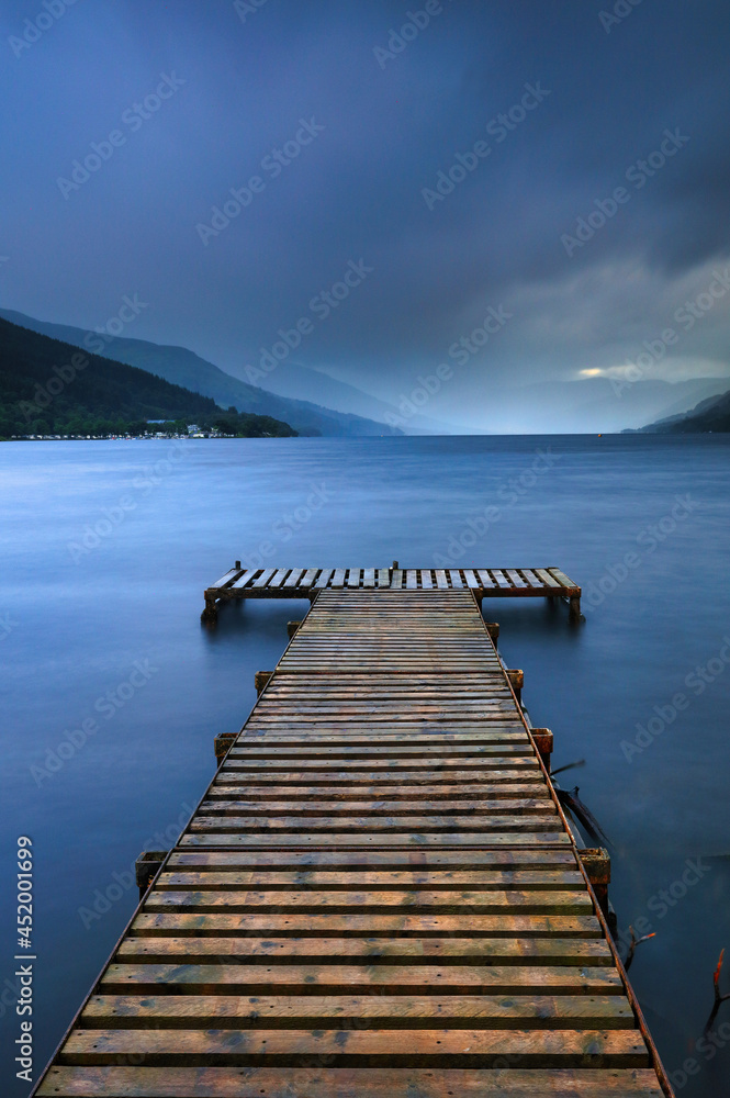 Moody Image of a Jetty looking down Loch Earn, Southern Highland, Scotland, UK.