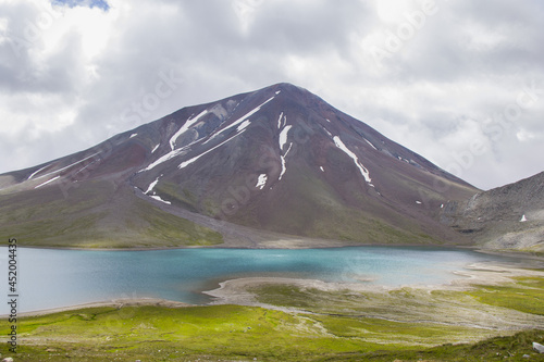 Beautiful Caucasian landscape and view of a lake and mountain range in Javakheti, Georgia photo