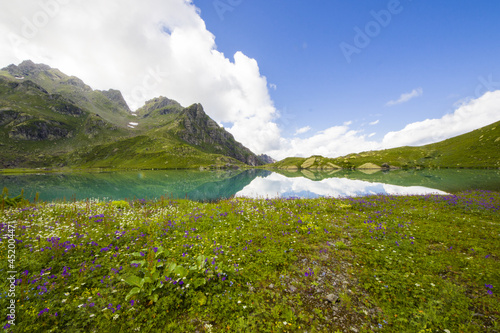 Beautiful alpine mountain lake landscape in Okhrotskhali in Svaneti, Georgia photo