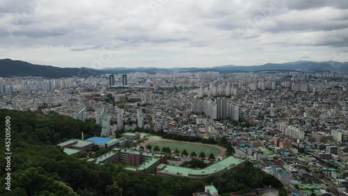 Aerial drone shot flying over Daejeon city in South Korea photo