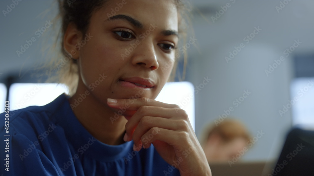 Businesswoman looking at smartphone screen. Woman with thinking face Businesswoman looking at smartphone screen. Woman with thinking face