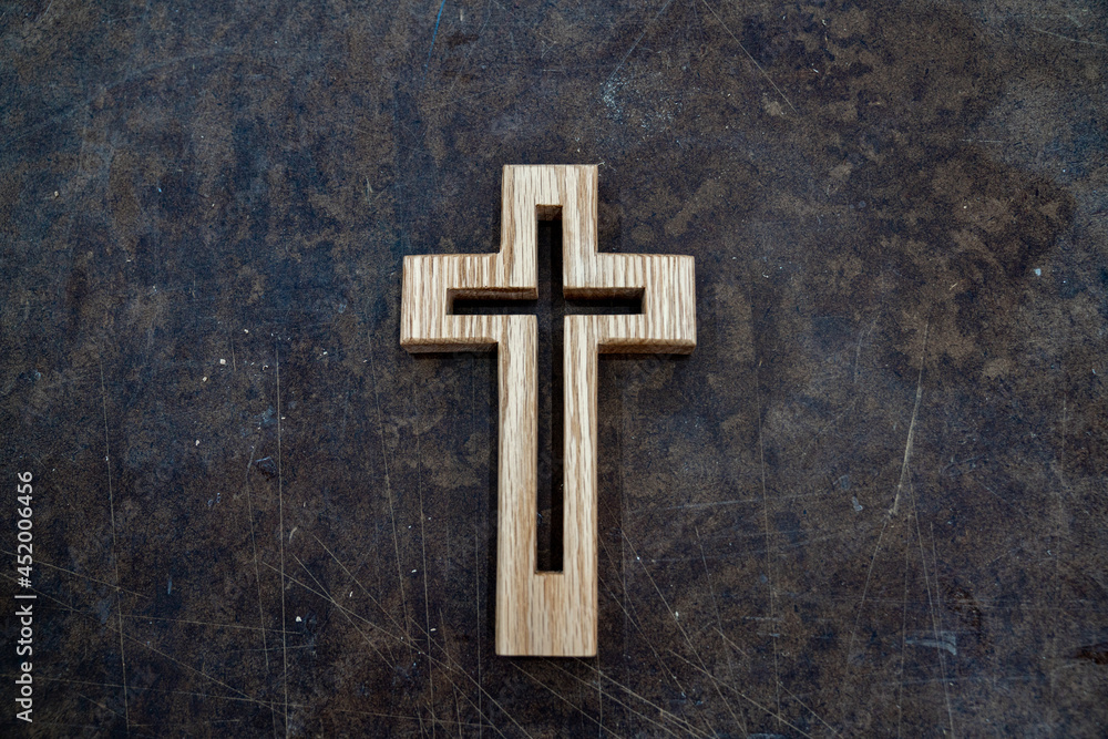 A background with traces of time, and Wooden Cross.