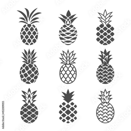 Abstract pineapple icons set in white and black color. Creative pineapples in a modern, simple style. Logo, symbol, emblem or icon of tropical fruit. Vector illustration.