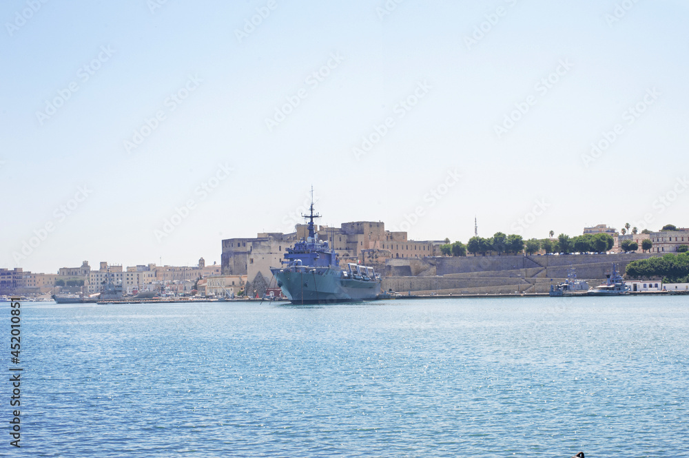 destroyer moored in the port of the ancient city of brindisi near the fortress Swabian Castle
