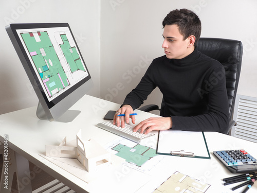 The interior designer consi...