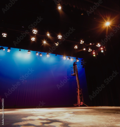 Stage Lights being set up on empty Stage photo