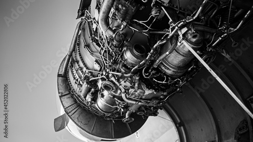 One of the engines of a commercial plane under repair photo
