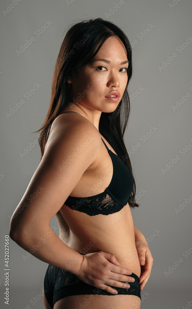 Asian woman in underwear in studio Asian woman in underwear in studio