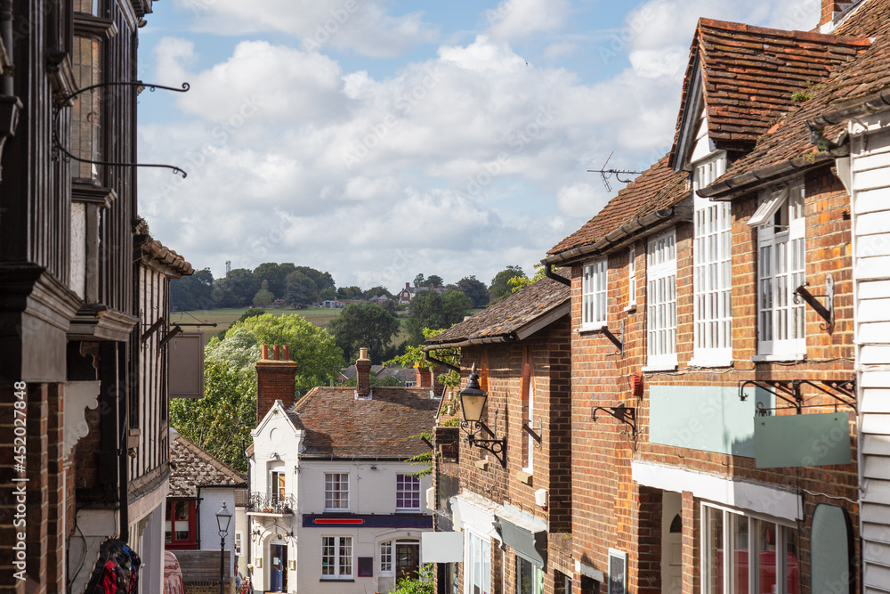 Fototapeta premium View of the hilly landscape from a small street in the picturesque village of Rye, England.