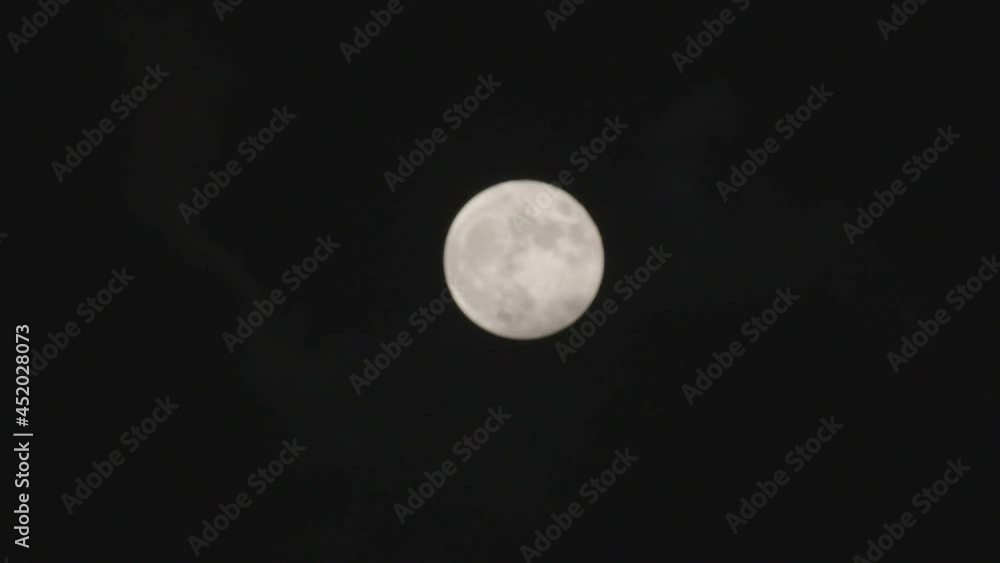Super Moon With Clouds Passing Over Super Moon With Clouds Passing Over