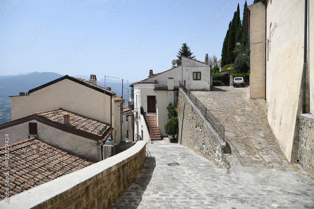 A street in the historic center of Chiaromonte, a old town in the Basilicata region, Italy. A street in the historic center of Chiaromonte, a old town in the Basilicata region, Italy.