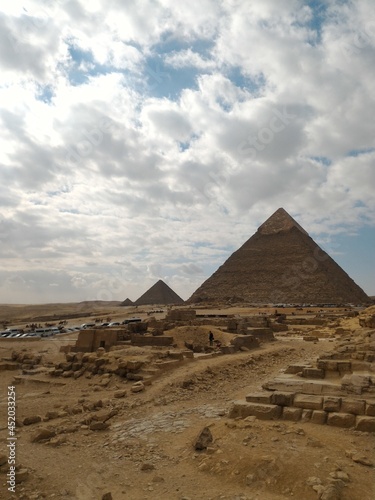 pyramids of giza under the clouds