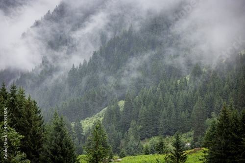 Fog in the Austrian Alps on a misty day - travel photography © 4kclips