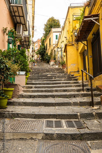 Stairs climbing the medieval alleys in the city of Naples