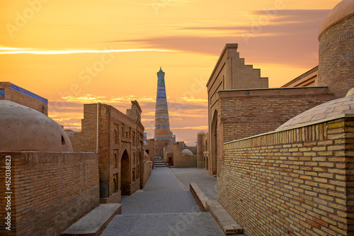 Old town Khiva with Islam Khoja Minaret in the background, Uzbekistan photo