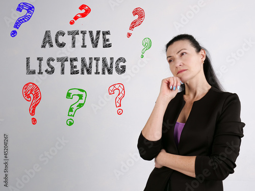 Business concept meaning ACTIVE LISTENING question marks with inscription on the side photo