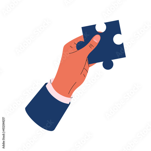 Flat vector cartoon illustration of a man's hand holding a puzzle isolated on a white background.