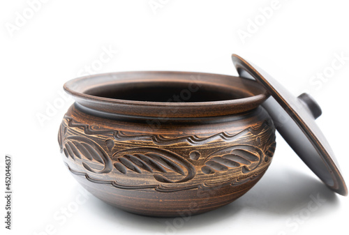 Clay pot for baking on a white background.