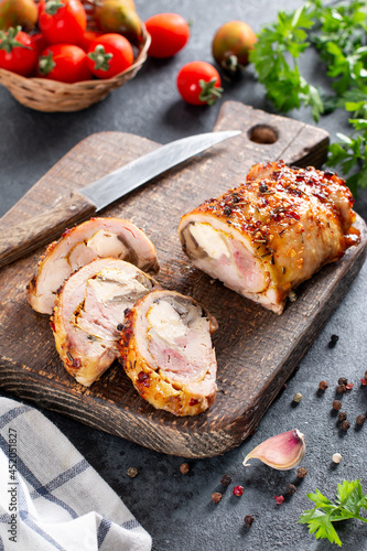 Stuffed roll of chicken with cheese and mushrooms