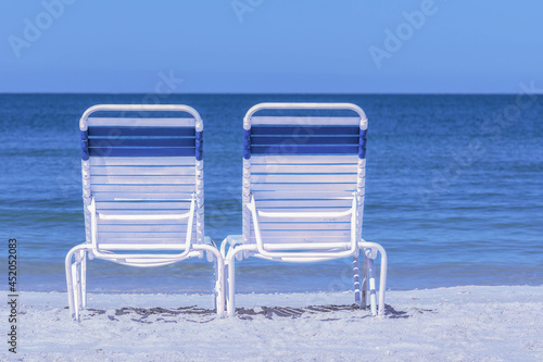 two chairs on the beach