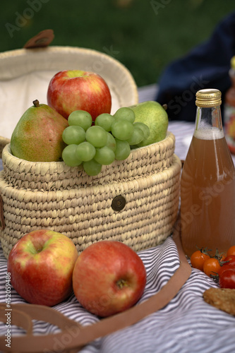 picnic at the park summer drinks grapes apples pears tomatoes cookies oatmeal grass 