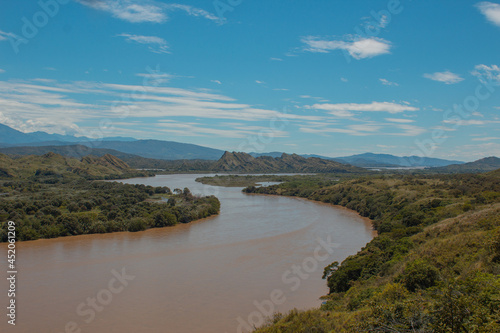 river in the mountains with blue sky