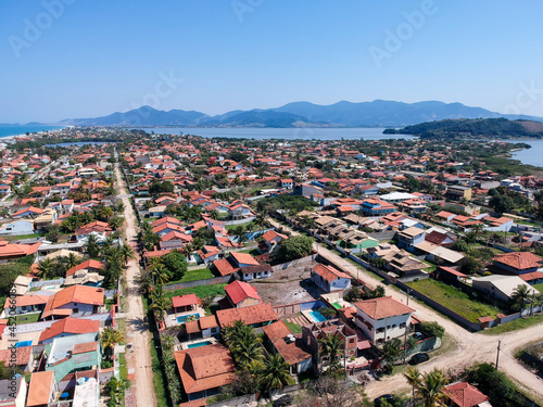 Aerial view of Saquarema and Itaúna beach in Rio de Janeiro. Famous for the waves and the church on top of the hill. Sunny day. drone photo. photo