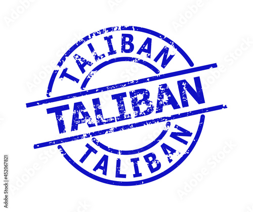 Blue TALIBAN round seal stamp. TALIBAN caption is inside round shape. Rough TALIBAN seal stamp in blue color, with scratched texture. photo