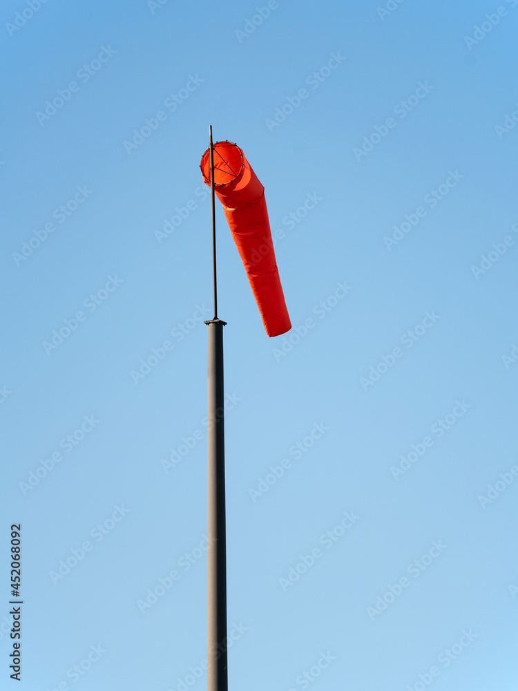 airport wind sock wind direction indicator portrait