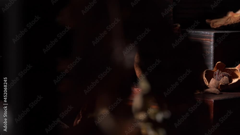 A variety of Chinese flavoring spices on a dark background A variety of Chinese flavoring spices on a dark background