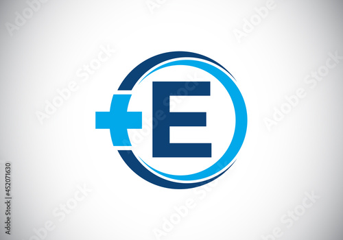 Initial E monogram alphabet in a circle with cross plus. Medical logo. Logo for pharmacy, clinic, medical or healthcare business, and company identity © BakiBullah