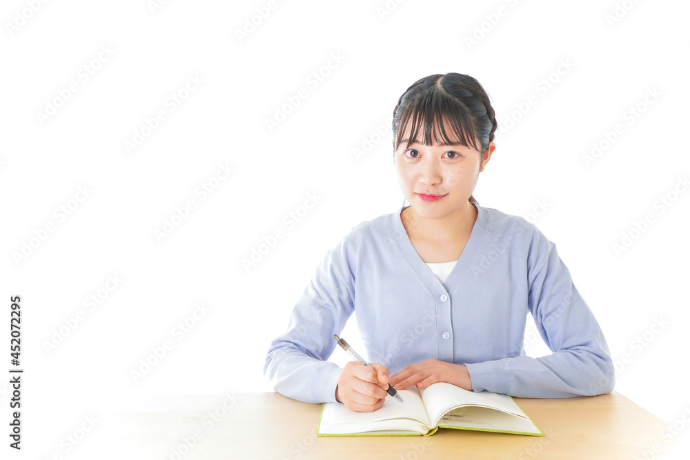 授業を受ける若い女子学生 授業を受ける若い女子学生