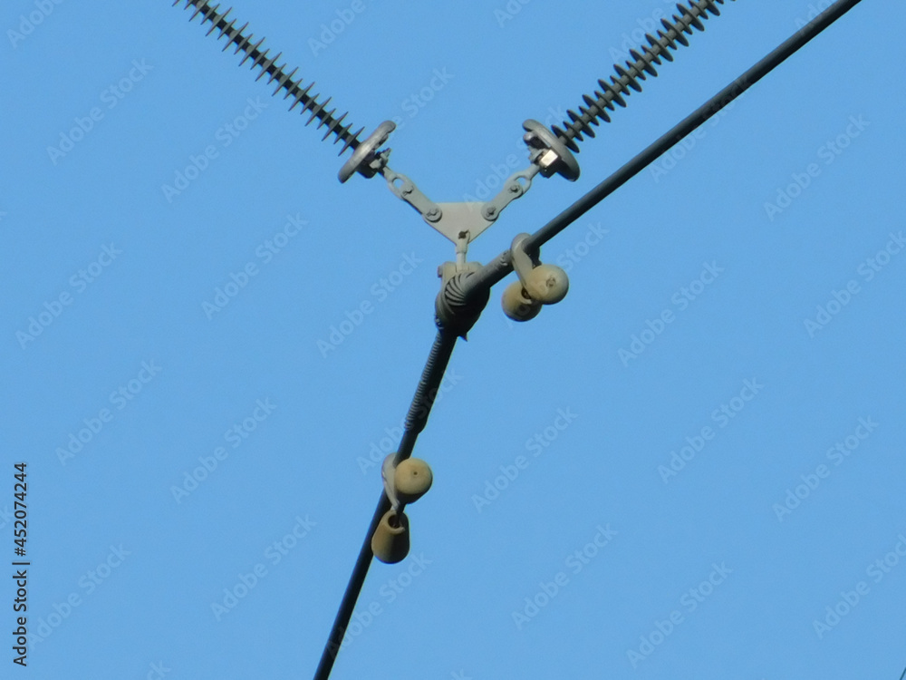 Close up of connectinons of powerlines to the powerpole/tower. Close up of connectinons of powerlines to the powerpole/tower.