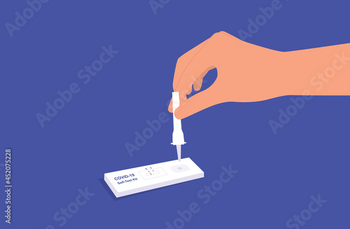 A Person Using COVID-19 Self-Test Kit. Coronavirus Detection Test Cassette And Extraction Buffer Tube. Rapid Antigen Home Test Kit. Lateral Flow Test.