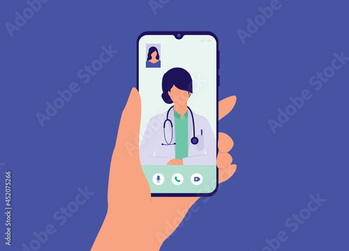 Slika na platnu A Patient's Hand Holding Smartphone Making Video Call With Female Doctor