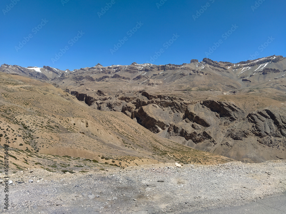 Very high altitude mountains without any vegetation in leh ladakh, India in summer Very high altitude mountains without any vegetation in leh ladakh, India in summer