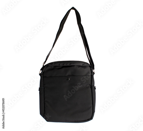 Isolated closeup studio shot of new small casual modern trendy fashionable fabric black messenger rider men sling bag handbag baggage with strap on white background