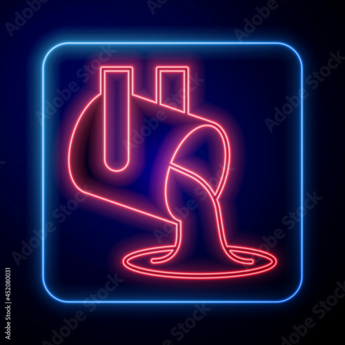 Glowing neon Molten gold being poured icon isolated on black background. Molten metal poured from ladle. Vector