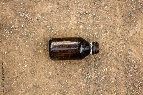 Old used glass bottle