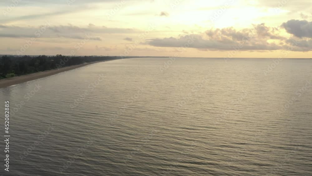 Aerial Views of Coastline, waves and beach at sunset time Aerial Views of Coastline, waves and beach at sunset time