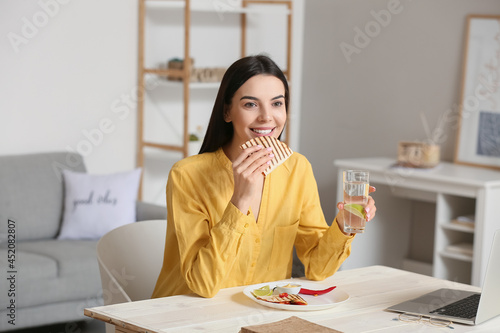 Beautiful young woman with ...