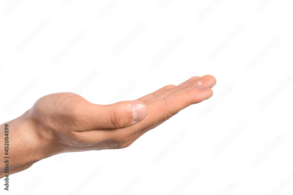 Male hand with contact lens on white background Male hand with contact lens on white background
