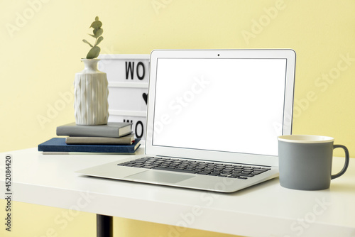 Wallpaper Mural Modern workplace with laptop in office Torontodigital.ca