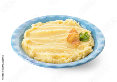 Plate of tasty mashed potatoes with garlic on white background