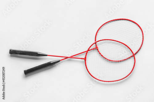 Badminton rackets on white background