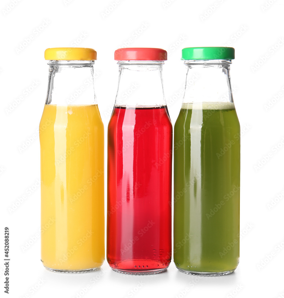 Bottles with healthy juice on white background Bottles with healthy juice on white background