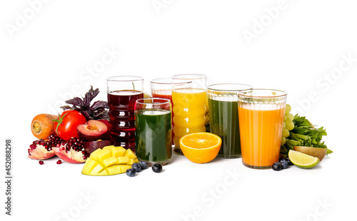 Glasses with healthy juice, fruits and vegetables on white background